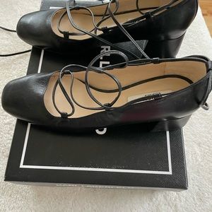 Karl Lagerfeld black leather pumps with lace-up feature
